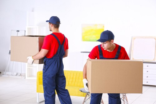 Packing boxes and materials prepared for a move in Acton