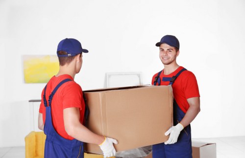 Removals team preparing a home move on an Acton residential street