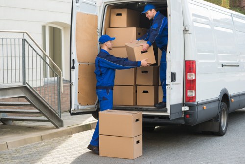 Removal van preparing to transport household items in Acton