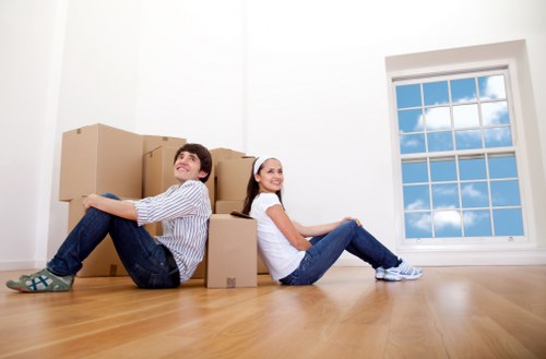 Careful loading of student furniture and boxes for an Acton move