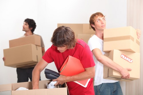 Furniture and household items prepared for charity donation after an Acton move