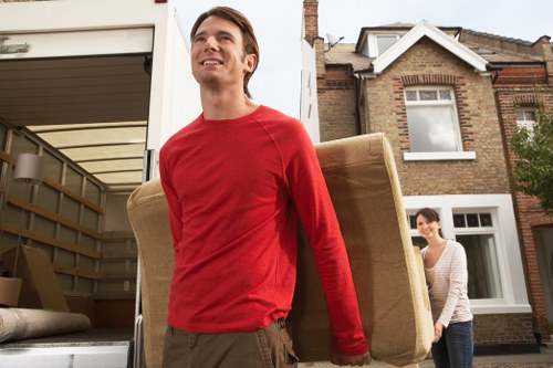 Local moving truck service helping with loading and delivery in Acton