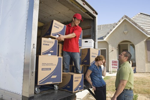 Professional movers loading belongings for an Acton relocation