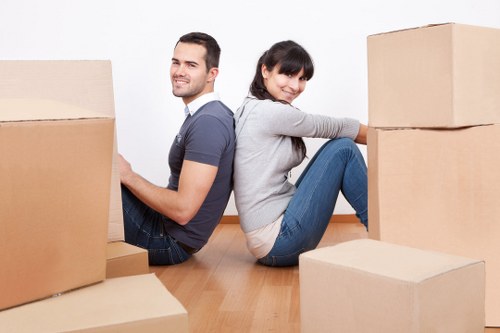Careful loading of household items for a flat removal in West London
